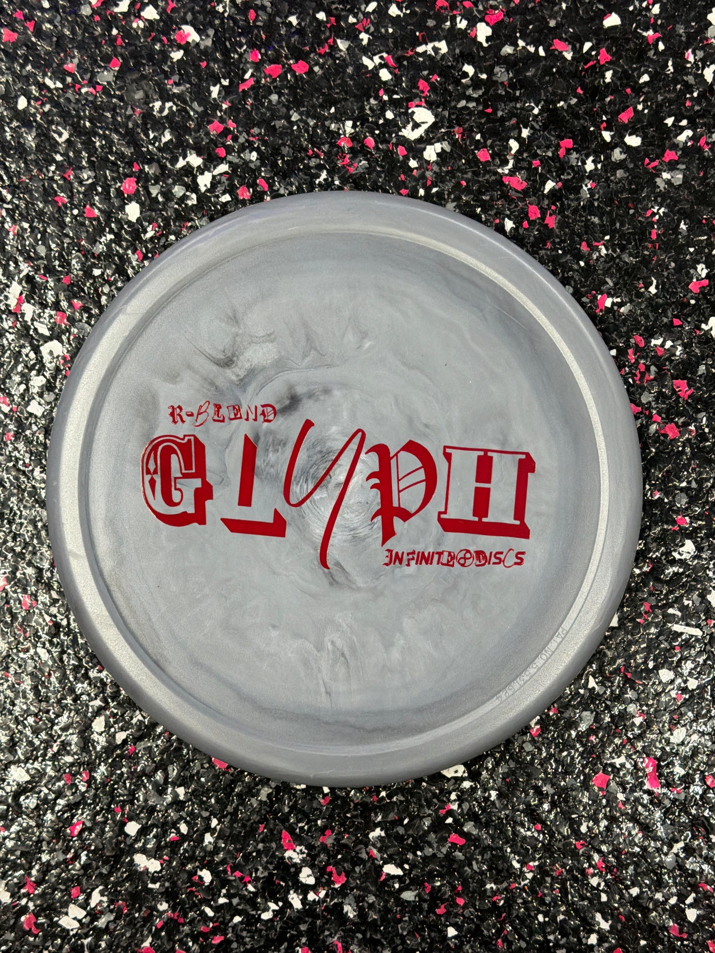 Infinite Discs Glyph | 1/5/0/1 | Rubber blend | Flake Glow C