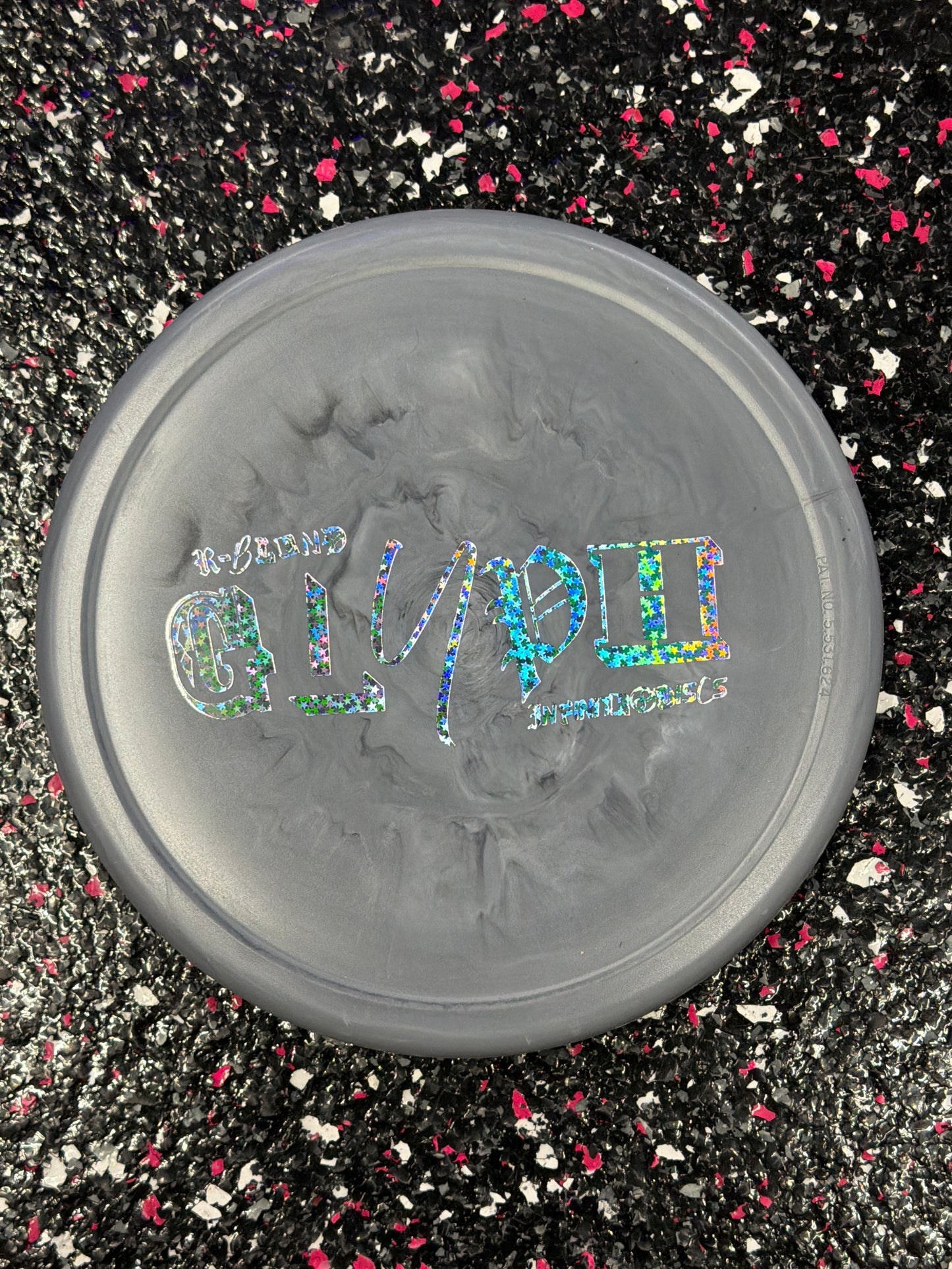 Infinite Discs Glyph | 1/5/0/1 | Rubber blend | Flake Glow C